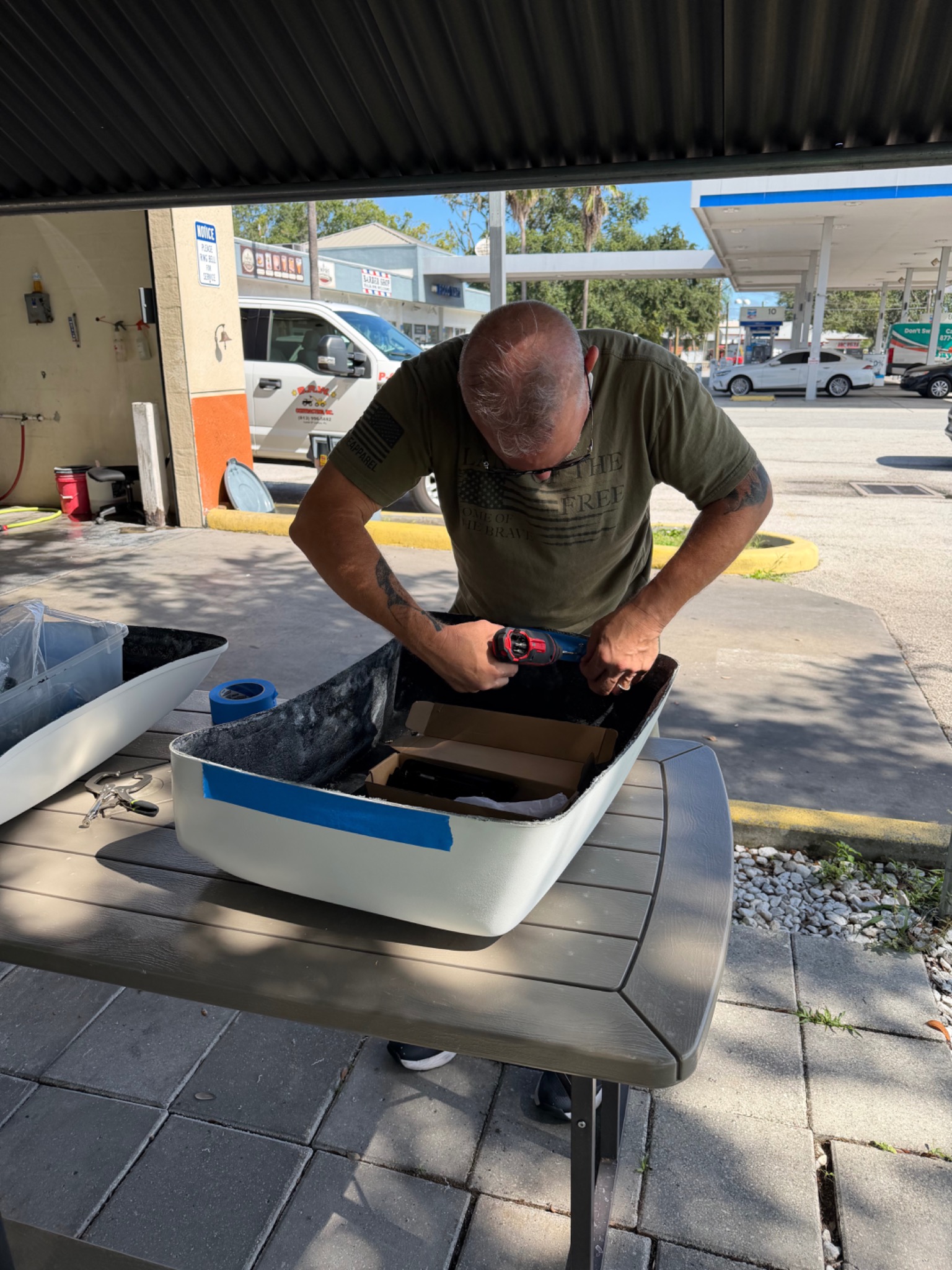 John working on the DOG PACK shell